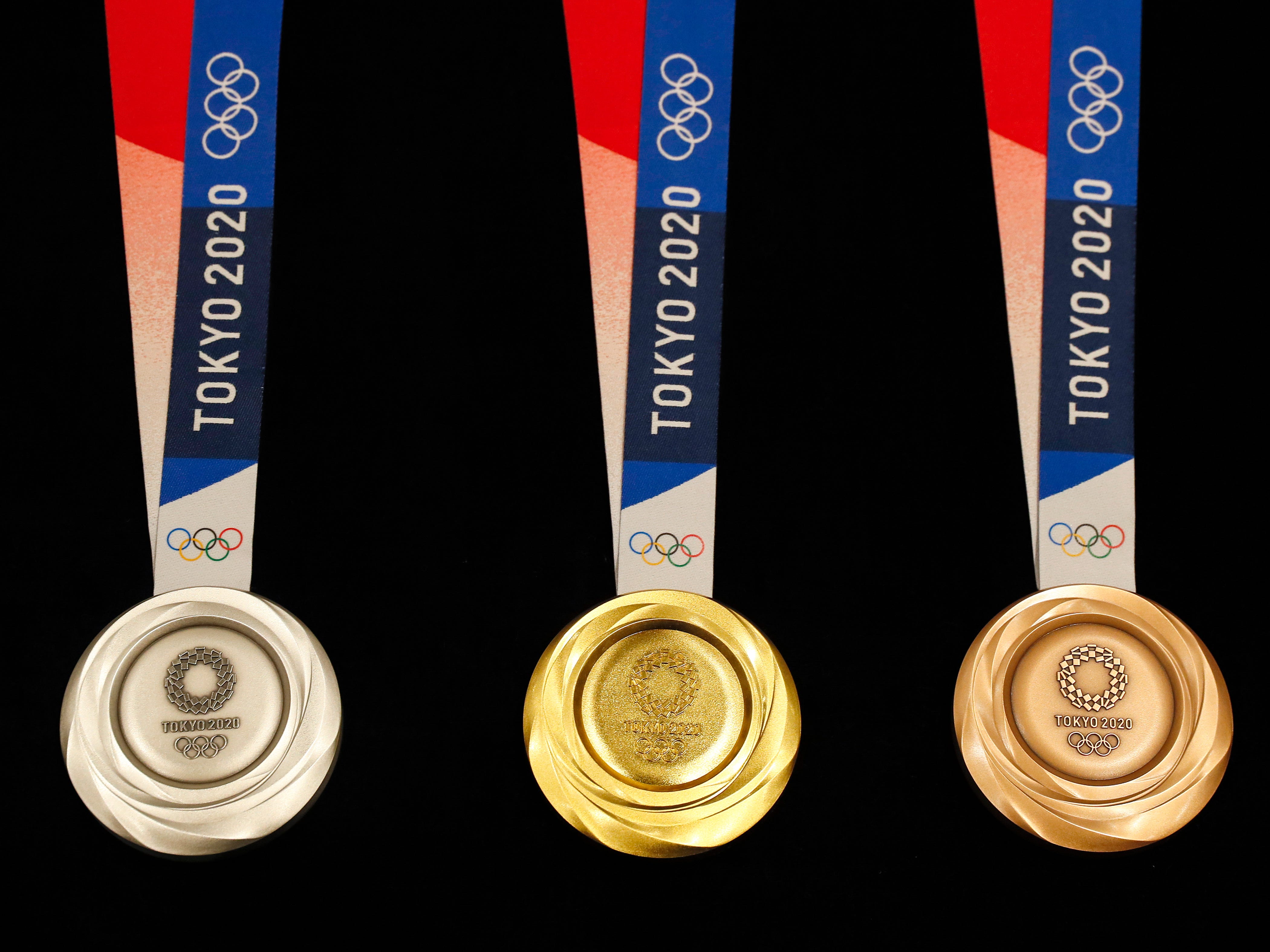 The silver, gold and bronze medals for the 2020 Summer Olympics. The front side carries the Tokyo Olympic emblem, with the Greek goddess of victory on the back.