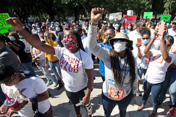 Demonstrators at the courthouse in Brunswick, Ga., on Friday protested the handling of the investigation into the shooting death of Ahmaud Arbery.